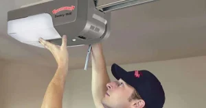 Person Checking Garage Door Openers
